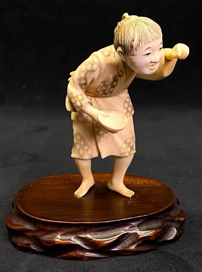 Antique Japanese Okimono of Woman: Antique Japanese Okimono of Woman Okimono of a woman holding a bowl, made of carved bone. Based on the styles, techniques, and materials, is believed to date from the late Meiji period. In good