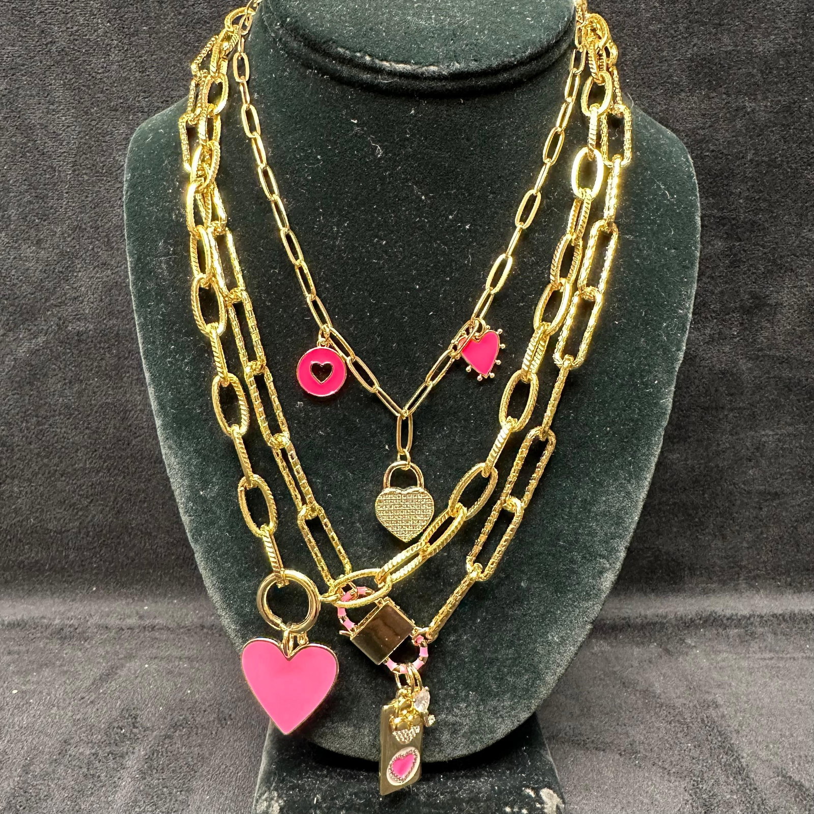 Melania Clara Alexa Rae Assorted Gold Necklace Rhinestone Accent Chain Set L97: The Melania Clara and Alexa Rae necklace set features a magnet clasp closure. The necklaces have magnet extender clasp closures. Each necklace showcases modernist designs with gold-toned and rhineston