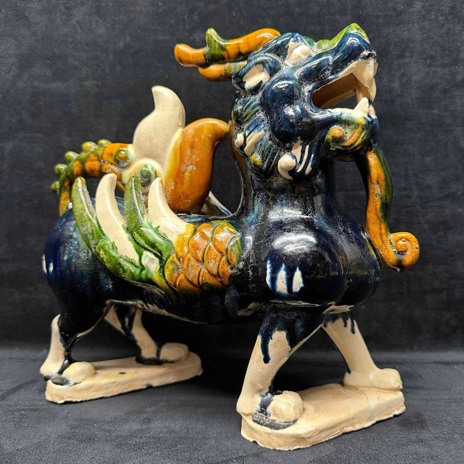 Chinese Sancai Glazed Ceramic Chimera Figurine Ming Dynasty Style J: Chinese Sancai Glazed Ceramic Chimera Figurine Ming Dynasty Style J. Striking sancai-glazed ceramic chimera with vivid cobalt blue, amber, green, and cream tones. Features include a muscular body, fla