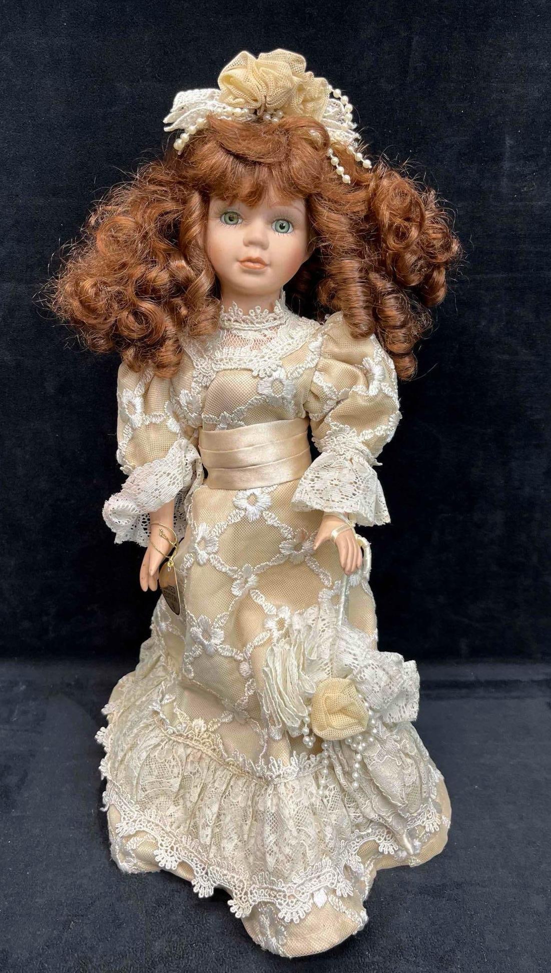 Limited Edition The Collectors Choice Series By Dan Dee Porcelain Doll: This lot contains a Limited Edition The Collectors Choice Series By Dan Dee Porcelain Doll. Total weight is 1.8lbs. With the stand laying flat it is approx 17" x 6"x 5 1/2"/ Overall the limited 
