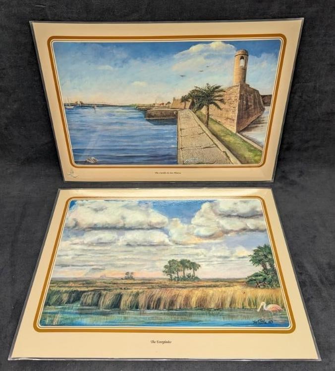 2 Mary Quinnan Whittle Old Florida Art Placemats: 2 Mary Quinnan Whittle Old Florida Art Placemats. This lot includes: (1) The Everglades. (1) The Castillo de San Marcos. (Has a rip on the left corner). The placemats are approx 15" x 11
