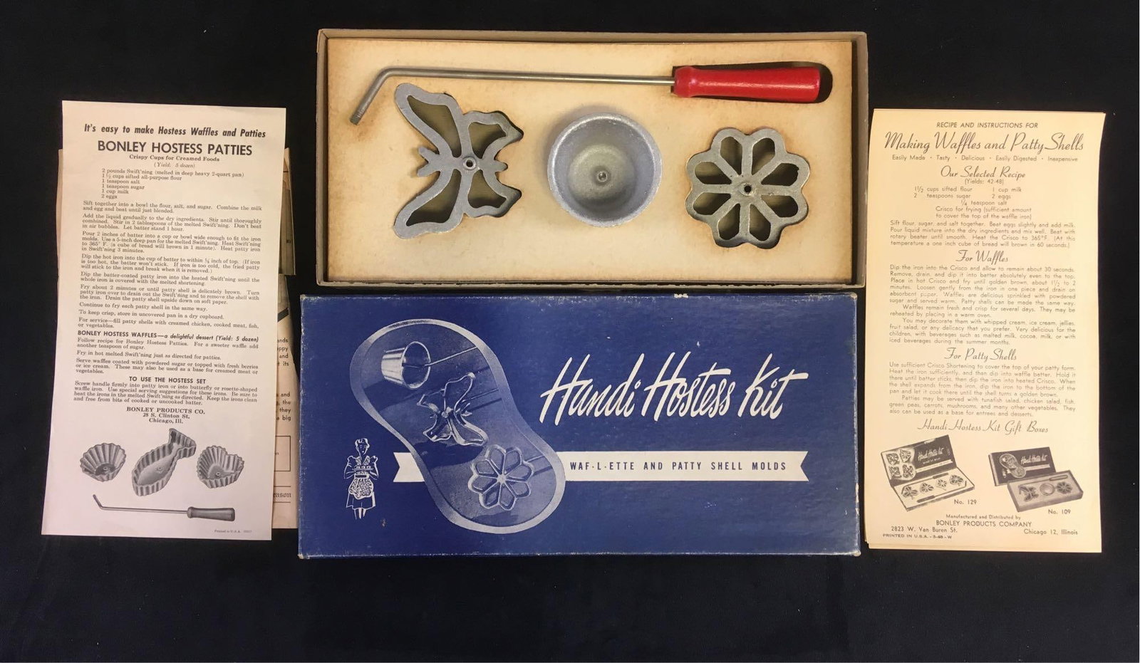 Vintage Handi Hostess Kit Waf l ette and Patty Shell Molds Set Waffle Irons by Bonley: Vintage Handi Hostess Kit Waf-l-ette and Patty Shell Molds Set, Waffle Irons by Bonley Products Company; this set appears to be unused. The set includes handle, 3 molds, recipe and instructi