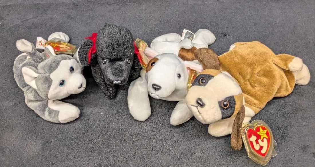 4 Beanie Babies Dogs Nanook Butch Gigi Bernie: 4 Beanie Babies Dogs Nanook Butch Gigi Bernie. This lot includes: (1) Nanook. This is approx 3 3/8" x 5 1/2" x 7 1/2". (1) Butch. This is approx 2 5/8"x 5" x 7" (1) Gigi. This