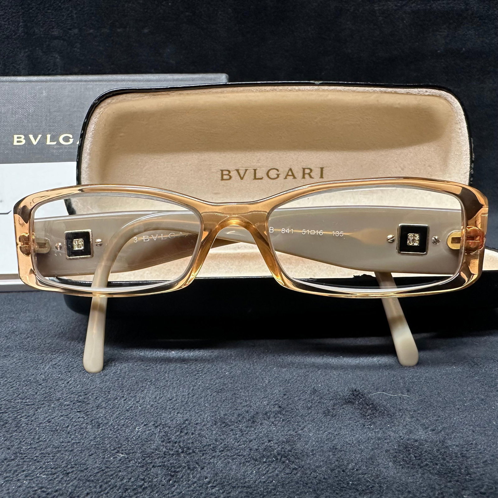 Bvlgari Crystal Temple Rectangle Eyeglasses Italy 475-B Beige Color: Marked Bvlgari on the interior arm. Frame size reads 475 B 841 51 16 135 Made in Italy. Includes original box and case. This item is in good pre-owned, previously displayed condition with light w