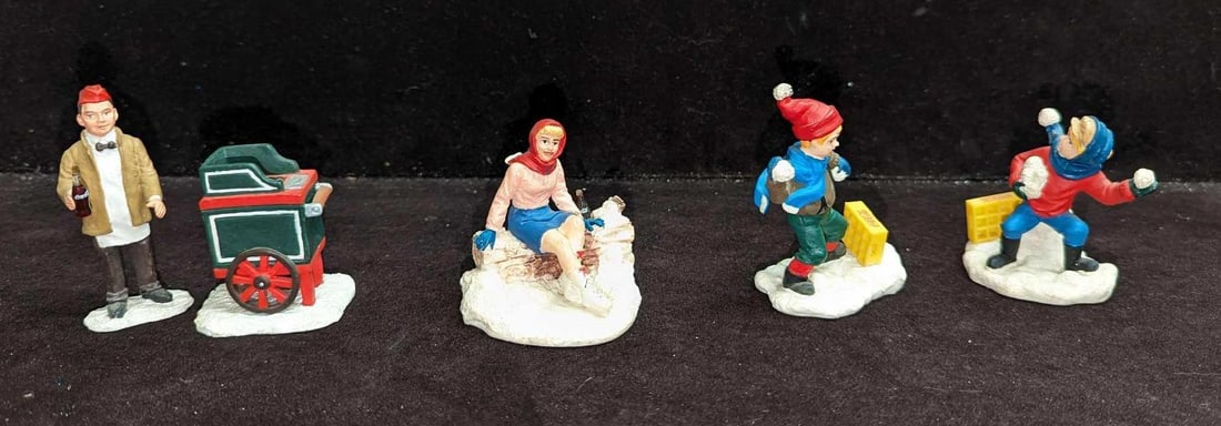 3 Coca-Cola Town Square Christmas Character Figurines: 3 Coca-Cola Town Square Christmas Character Figurines. This lot includes: (1) "Boys are Boys". Two figurines of two boys throwing snow. (1) "Skater Pause". An ice skater takes a 