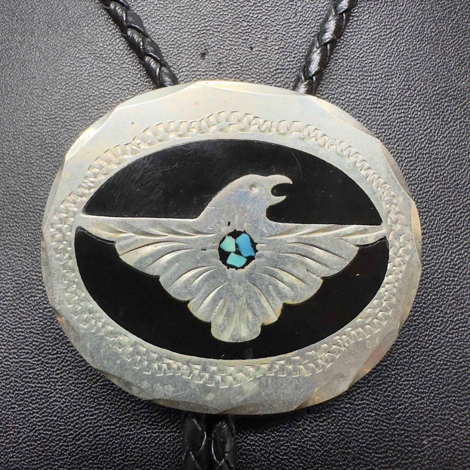 Bennett Bolo Tie Silver Toned Turquoise Coral Inlay Pat Pend Native American Eagle Style: Bennett Bolo Tie Silver Toned Turquoise Coral Inlay Pat Pend Native American Eagle Style. Bennett Patent Pend. etched marking on the back. This item is in good pre-owned, previously displayed conditio