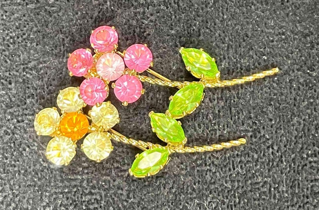 Signed Nolan Miller Flower Buddies Two Dainty Brooches: This lot contains Signed Nolan Miller Flower Buddies Two Dainty Brooches. Each brooch is approx 2" x 3/4" x 1/2". Together they weigh about 0.2oz. Overall the vintage brooches are in excellent pr