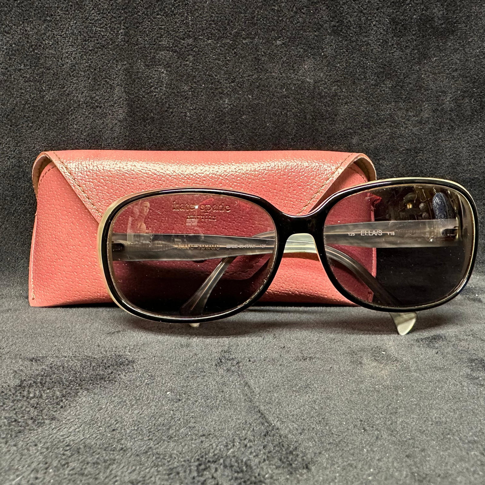 Kate Spade ELLAS Sunglasses with Case: Kate Spade designer sunglasses, model ELLAS. Rectangular frames with translucent light-tone acetate and darker exterior accents. Lenses are tinted and marked Kate Spade. Arms stamped Kate Spade Made i