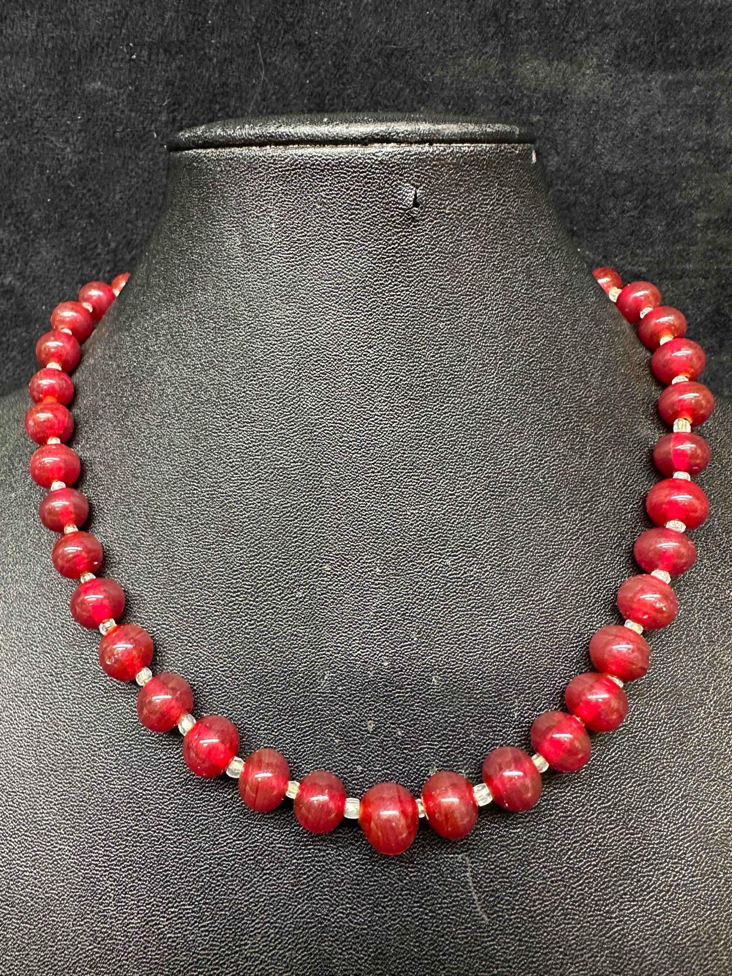 Murano Venetian Lamp Work Art Glass Clear Dark Red Beaded Necklace F16: Murano Venetian Lamp Work Art Glass Clear Dark Red Beaded Necklace F16. Necklace with dark red colored glass beads with a beautiful design on each. The necklace features a open box clasp closure. This