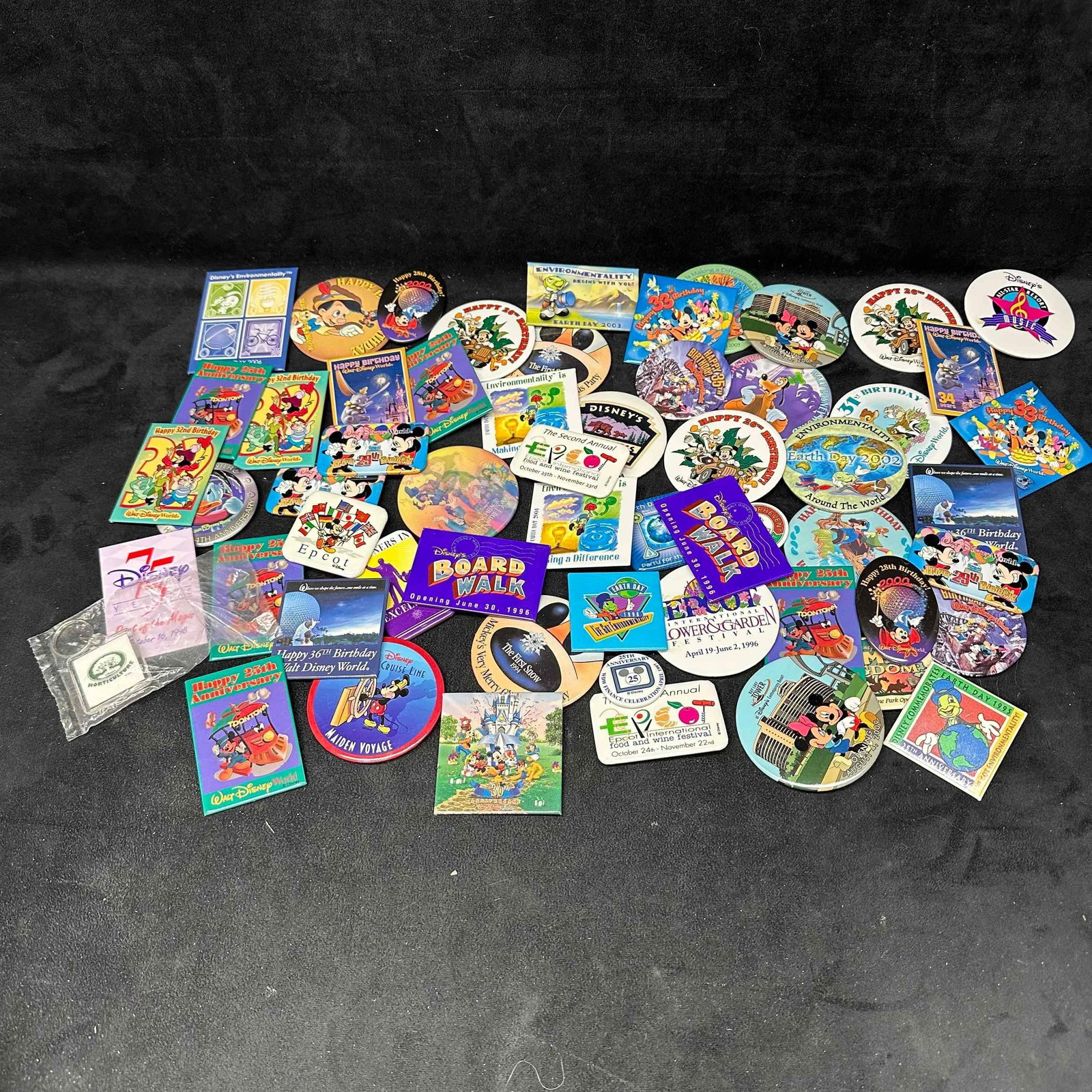 Large Lot of Vintage Disney Collectible Buttons Park Anniversaries Events, EPCOT Boardwalk Mickey: Collection of Disney collectible buttons, many from Walt Disney World events and anniversaries. Includes EPCOT International Food & Wine Festival, Disney’s Boardwalk Opening (1996), ToonTown