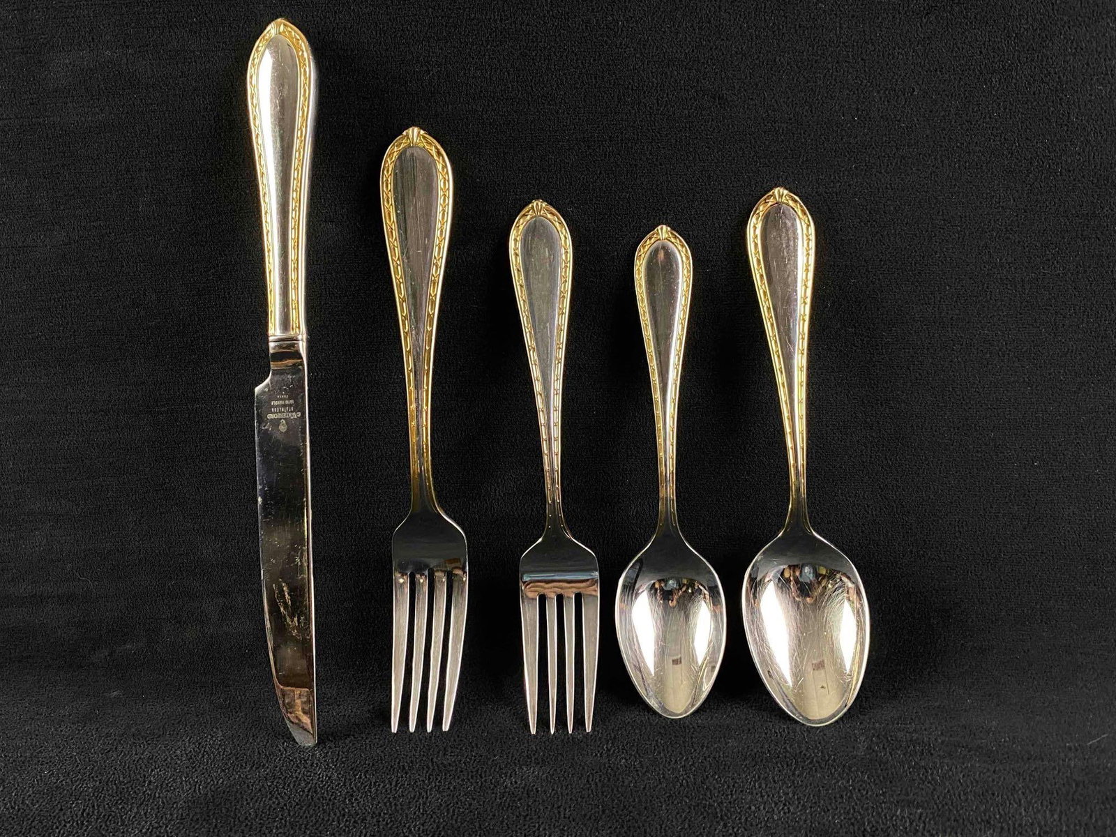 WATERFORD 5 Pc Setting Powerscourt Stainless Gold Accent Flatware (JB): This retired in 2011 5 pc Waterford set is used but in very good condition with zero gold loss includes the following: 1: French Hollow Knife 9 5/8" 1: Individual Salad Fork 7 1/8" 1: Fork