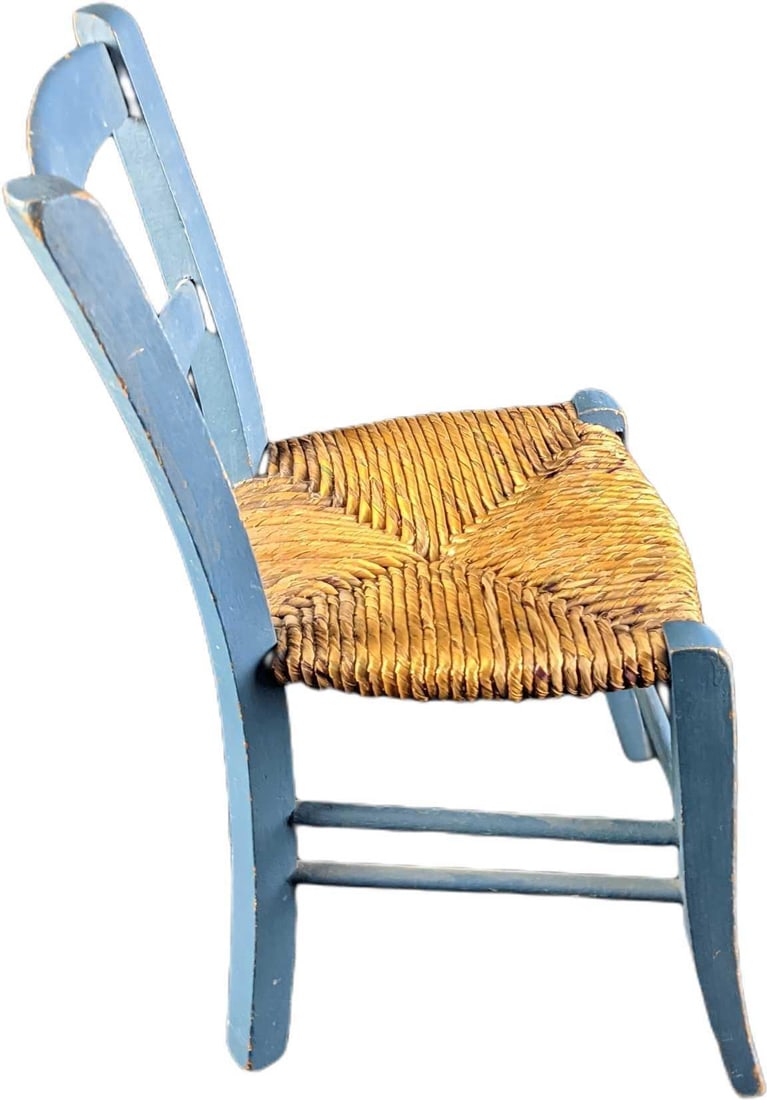Childs Vintage Wooden And Wicker Chair A: This lot contains a Childs Vintage Wooden And Wicker Chair The chair is hand painted blue with a wicker seat. It is approx 10 1/2" x 12" x 18 1/2" and it weighs 1.5lb. The chair is in a good, vintage 