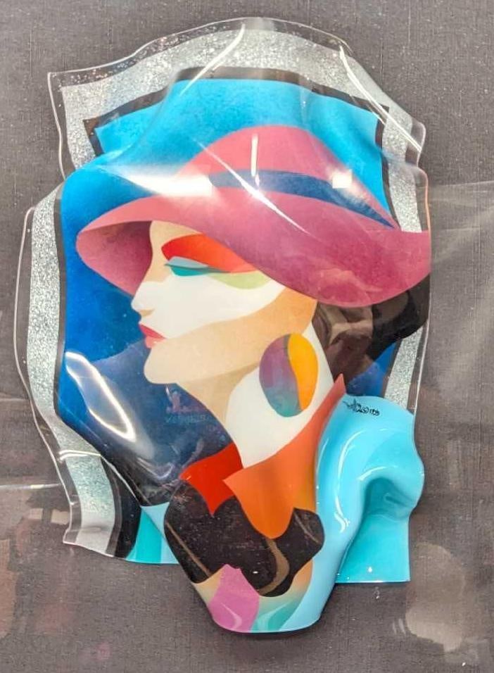 Framed Ned Moulton Lady In The Pink Hat Sculpture Acrylic: Framed Ned Moulton Lady In The Pink Hat Sculpture Acrylic. This is approx 16 1/2" x 4 5/8" x 20 1/4" and it weighs 9.50lbs. The frame has some scratches and there is some debris in
