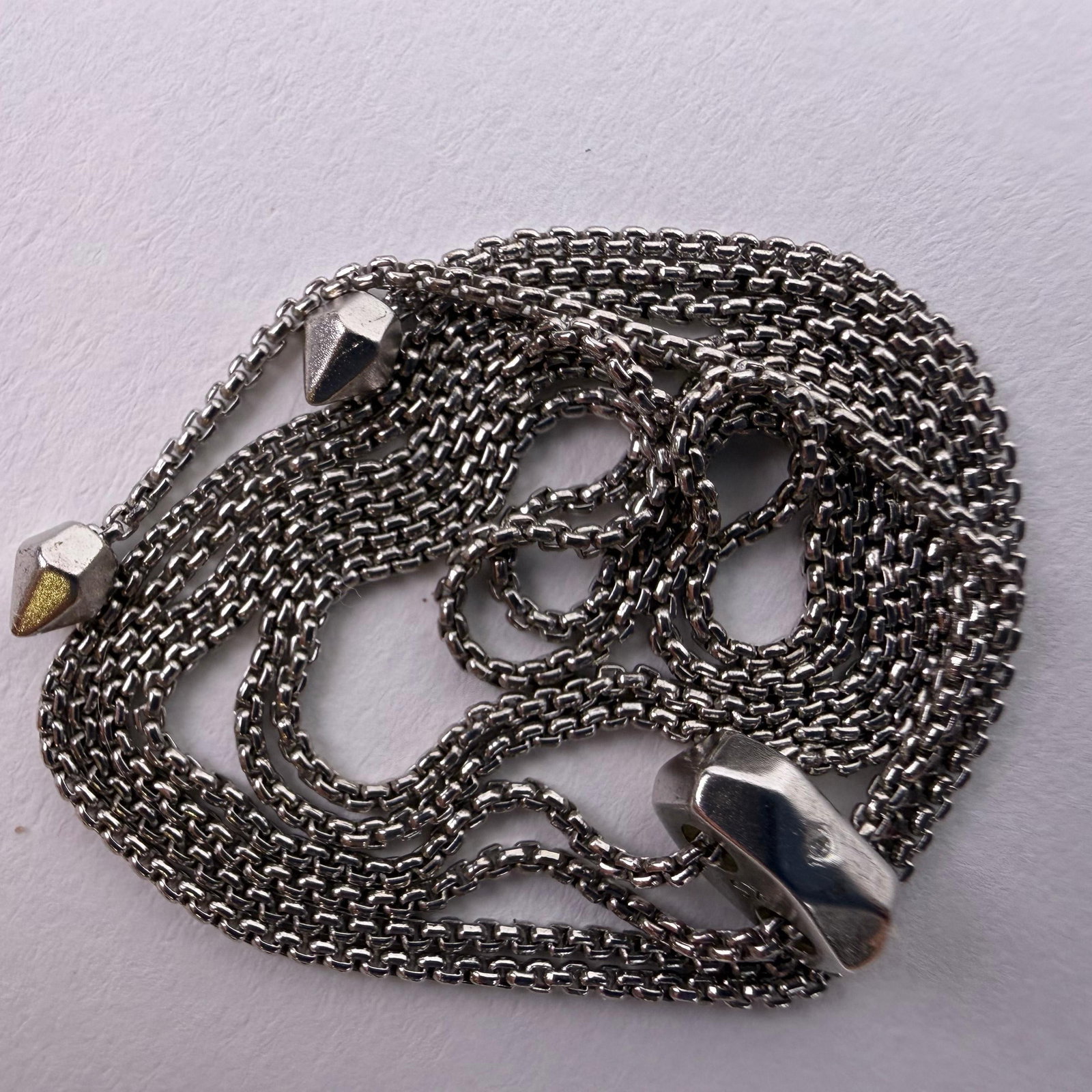 Kendra Scott Bolo Slider Necklace Silver Tone KS: Kendra Scott silvertone necklace featuring a woven round box chain style with adjustable slider. Marked KS. This item is in pre-owned, previously used/displayed condition with noticeable light wear an