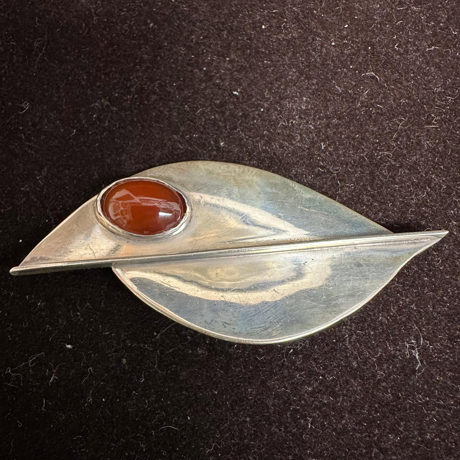 Modernist Sterling Silver Carnelian Stylized Leaf Brooch L20: This item is in good pre-owned, previously used/displayed condition with noticeable light wear and surface scratches. Please reference all photos for full details. This piece of jewelry has been teste