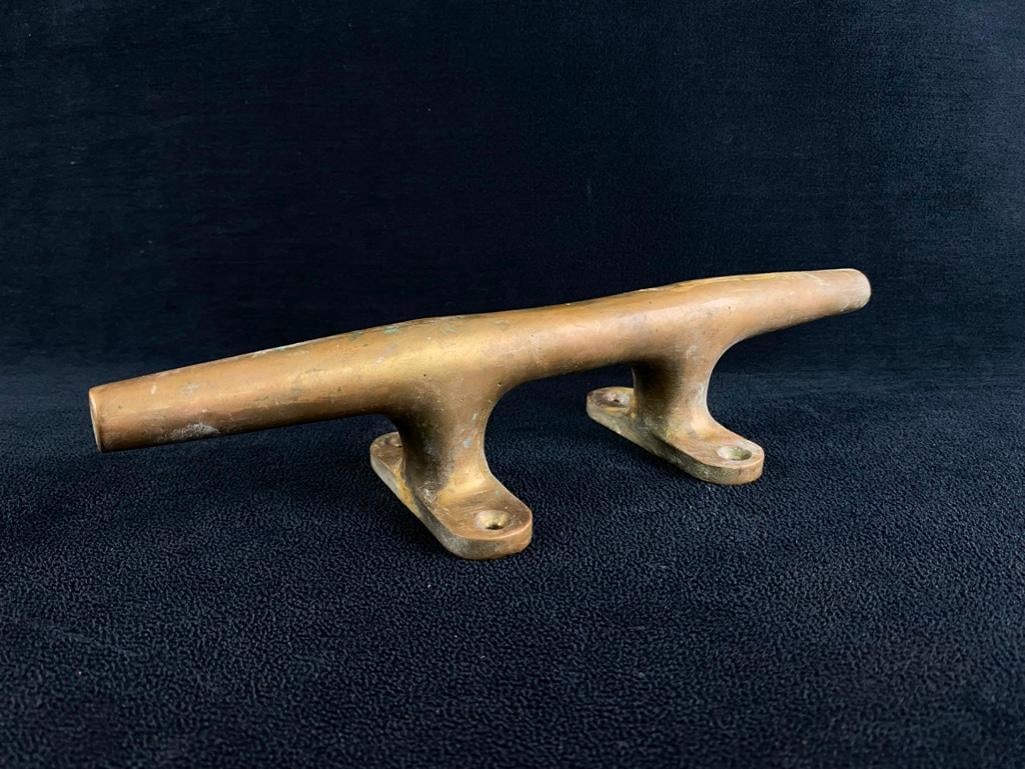 Antique 10" Brass Dock Cleat: Antique 10" Brass Dock Cleat Brass 10" dock cleat, unknown vintage with great patina. Very cool piece, attached with 4 screws. Approximate size: 10" x 3" x 2.5" Approximate weight:
