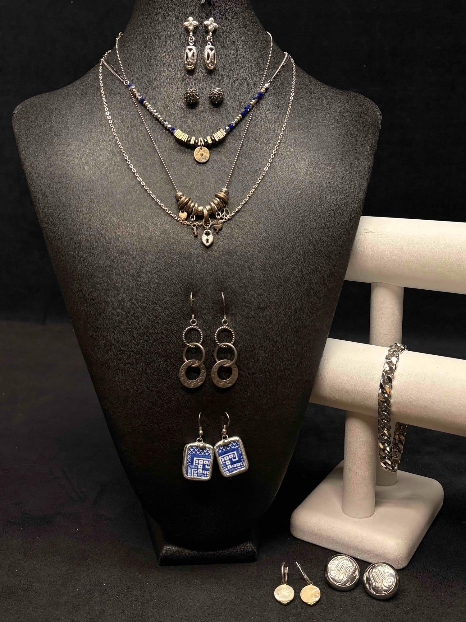 10pc Cobalt and Coin Mixed Costume Jewelry Lot: This lot contains 10 pieces of costume jewelry, all of which in overall good condition with minor flaws due to age and use. Please refer to the images provided for full context of the lot's condit