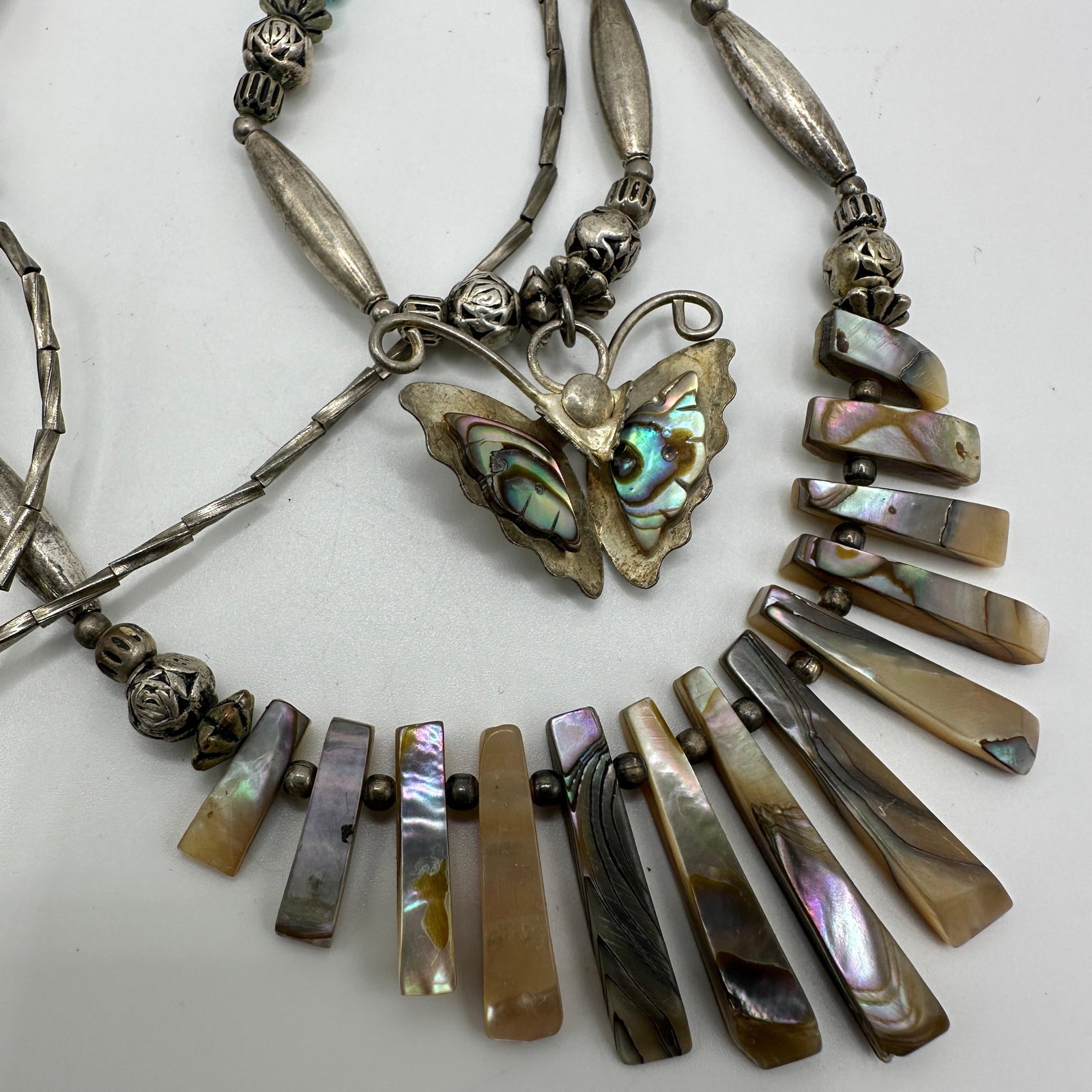 Native Style Silver Turquoise And Abalone Shell Necklace Butterfly Pendant: This item is in good pre-owned, previously used/displayed condition with noticeable light wear and surface scratches. Please reference all photos for full details. This piece of jewelry has been teste