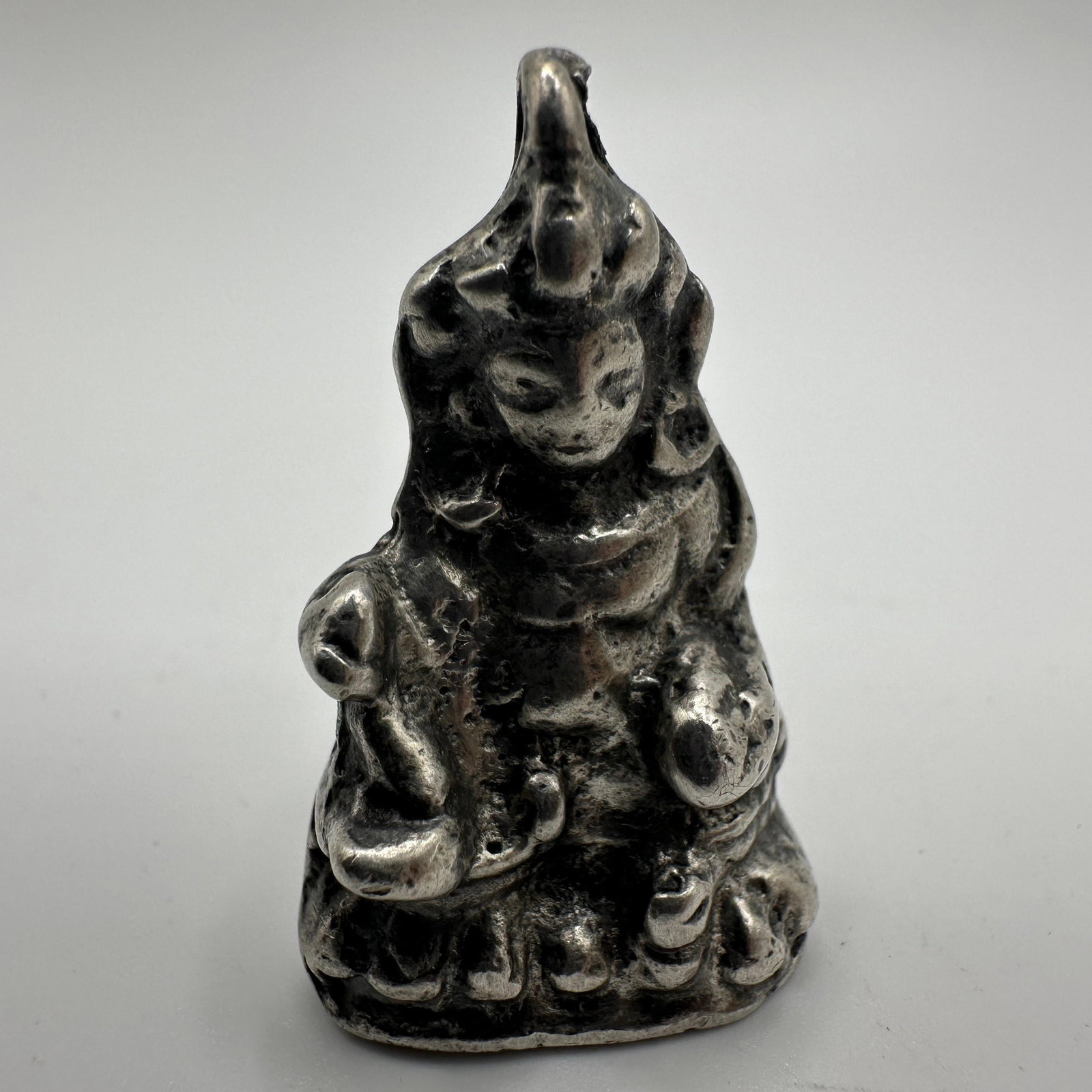 Tibetan Asian Style Deity Seated Figure Silver Pendant R11: This item is in pre-owned, previously used/displayed condition with noticeable light wear and surface scratches. Please reference all photos for full details. This piece of jewelry has been tested and