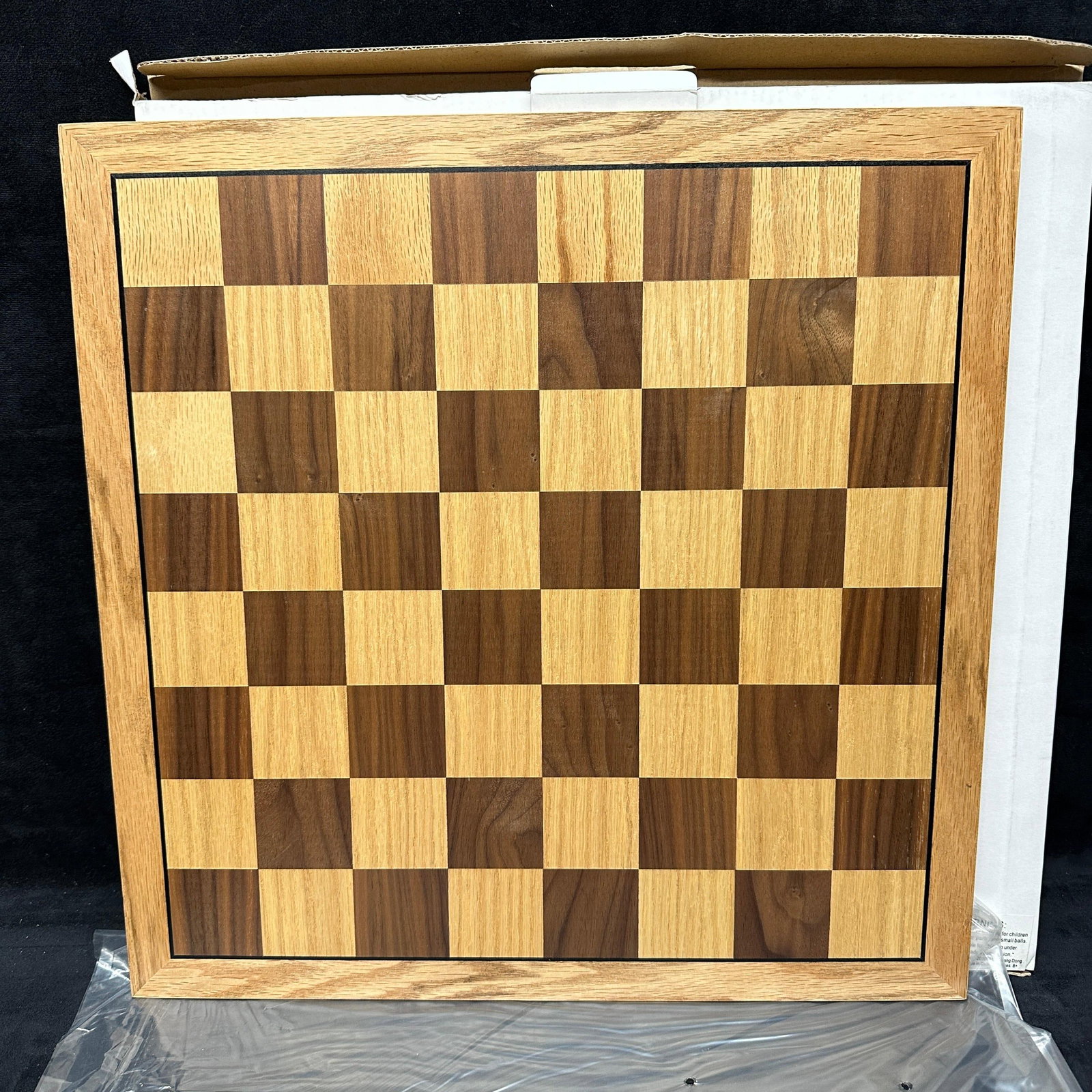 Wood Chessboard Walnut and Oak Style Wooden Chess Board: Wood chessboard with walnut and oak-toned style light wood squares, framed. The condition shows minor surface wear. Light surface wear consistent with use; no pieces included. Original box included. P