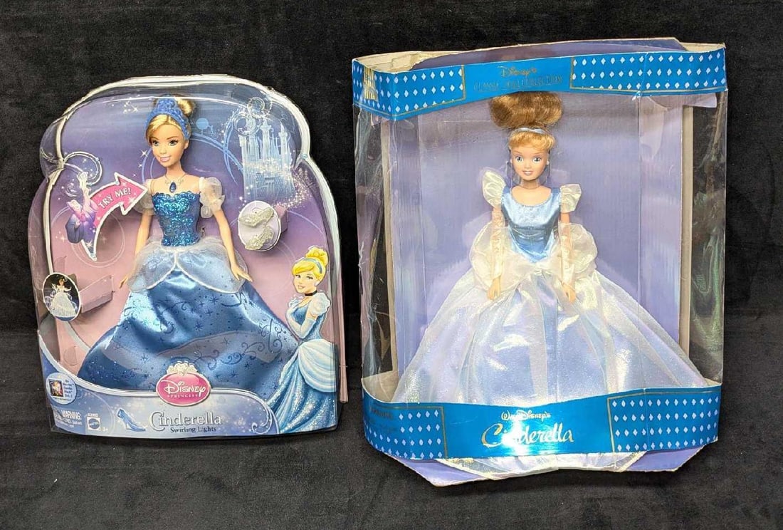 2 Disney Cinderella Classic And Swirling Lights Dolls: 2 Disney Cinderella Classic And Swirling Lights Dolls. This lot includes: (1) Disney's Classic Doll Collection - Cinderella. The doll comes in the original box that is approx 12 1/4" x 3