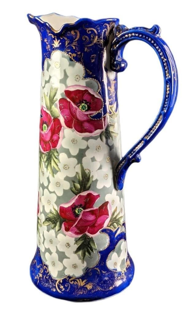 Antique Victorian Ewer Water Pitcher Cobalt Blue With Flowers: Antique Victorian Ewer Water Pitcher Cobalt Blue With Flowers. Was made in the late 1800s. The ewer is approx 9" x 6 1/2" x 15 1/2" and weighs 4.93 lbs and is in good, vintage condition with some wear