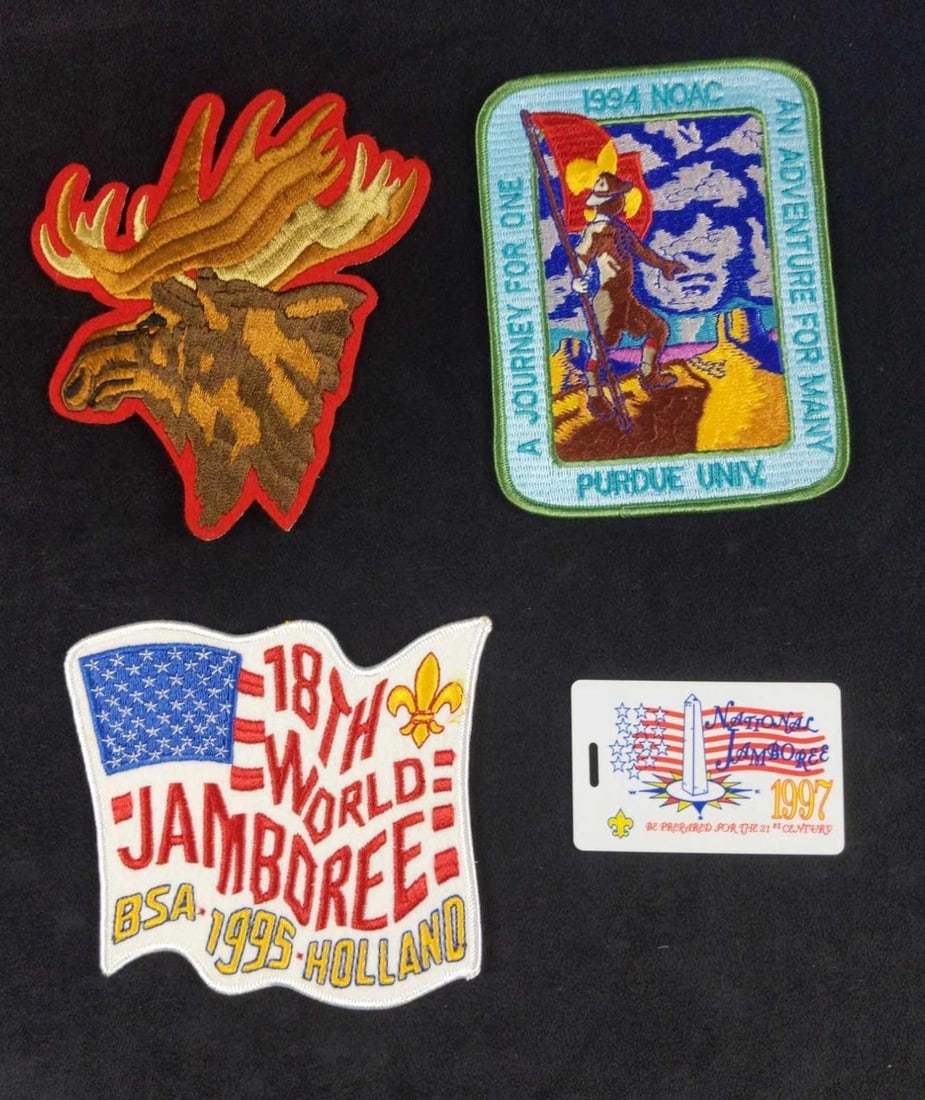 Three Large Boy Scout jamboree Badges And ID Card: This lot consists of: (1) National Jamboree 1997 Activity/ID Card. Is approx 3 1/2" x 2". The card has slight wearing. (1) US Flag 18th World Jamboree BSA - 1995 Holland Badge. Is approx