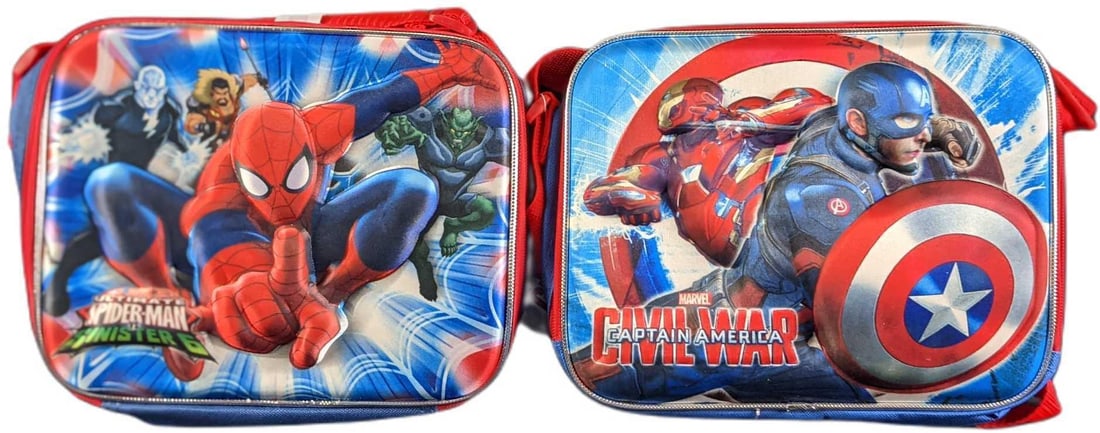 Spider-Man Vs Sinister 6 and "Captain America: Civil War" Insulated Bags by Ruz": This lot includes an "Spider-Man Vs Sinister 6" and "Captain America: Civil War" Insulated Bags by Ruz". Each bag is approx 9" x 1 1/2" x 8" and together they weigh 1lb. The bags are unused 