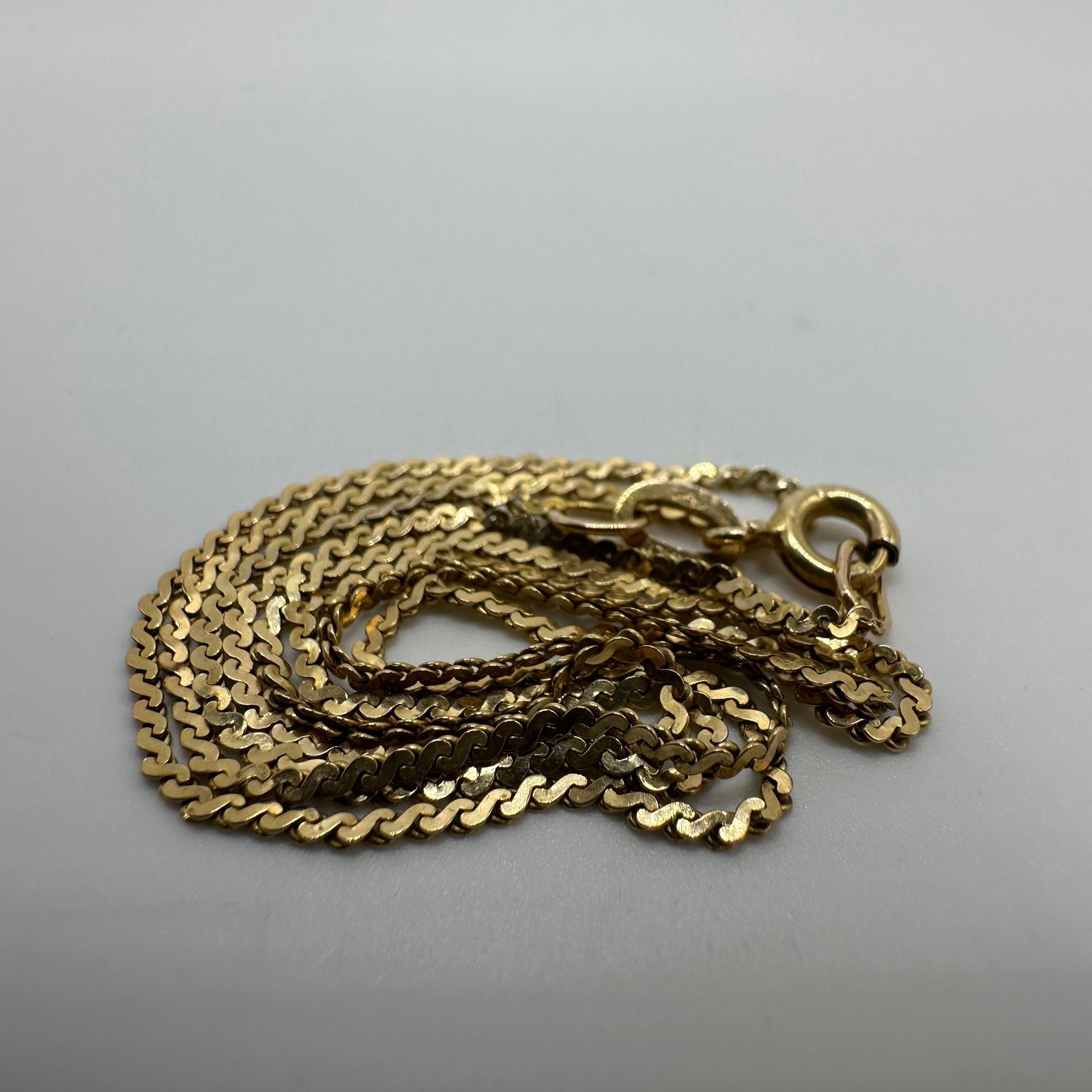 14K Italy Gold S Style Link Chain Necklace W39: This item is in good pre-owned, previously used/displayed condition with noticeable light wear and surface scratches. Please reference all photos for full details. This piece of jewelry has been teste