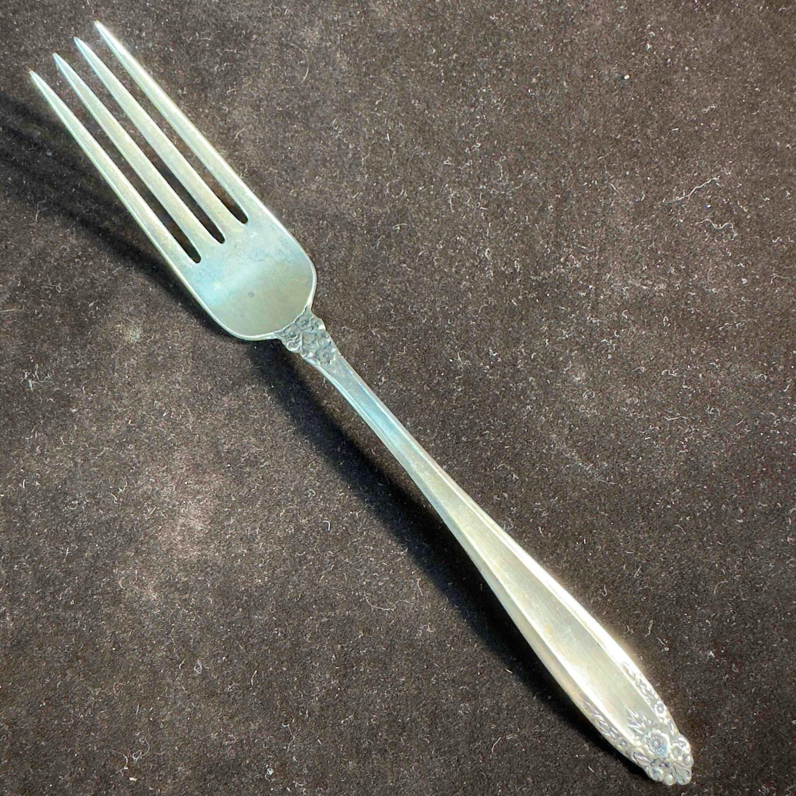 International Prelude Sterling Silver Dinner Fork: International Prelude Sterling Silver Dinner Fork. First introduced in 1939, Prelude has become one of the best-selling sterling silver patterns of all time. Slender handles combine with two floral
