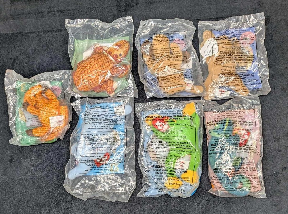 7 Burger King McDonalds Teenie Babies Armadillo: 7 Burger King McDonalds Teenie Babies Armadillo. The lot includes: (1) Spunky The Cocker Spaniel. #4. (1) Bones. #9. (1) Twigs. #3. (1) Peanut. #12. (1) Smoochy The Frog. #3. (1) Iggy The Iguana. #6.