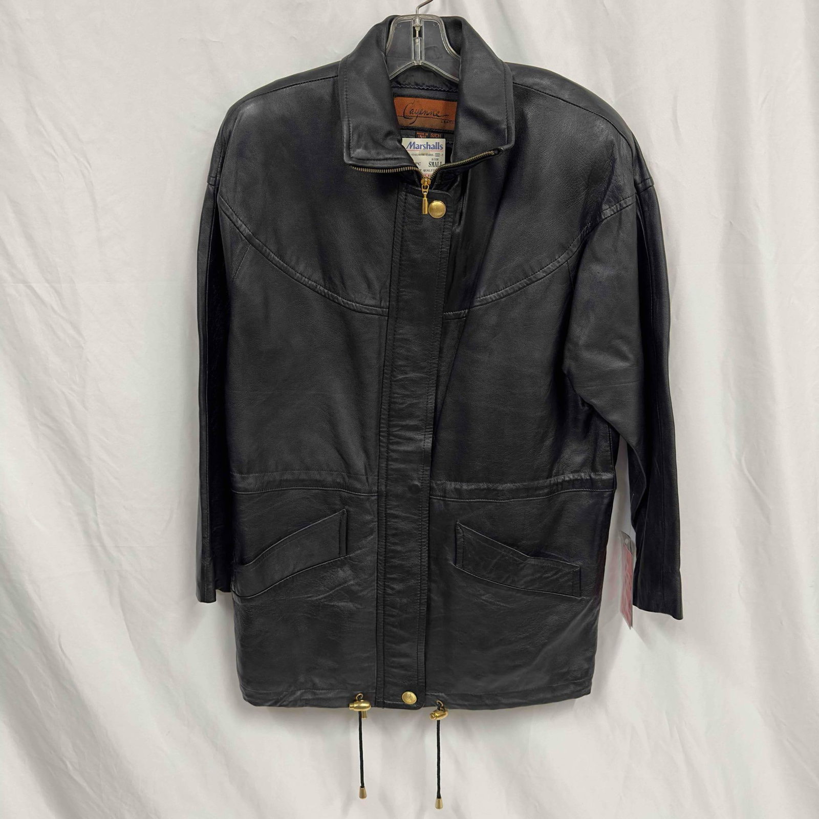 Cayenne Leather Rain Jacket Black Gold Toned Accents Small: Cayenne Leather Rain Jacket Black Gold Toned Accents Small. This jacket has gold toned buttons and zipper closure. The jacket features two front pockets as well as two pull string closures on the wais