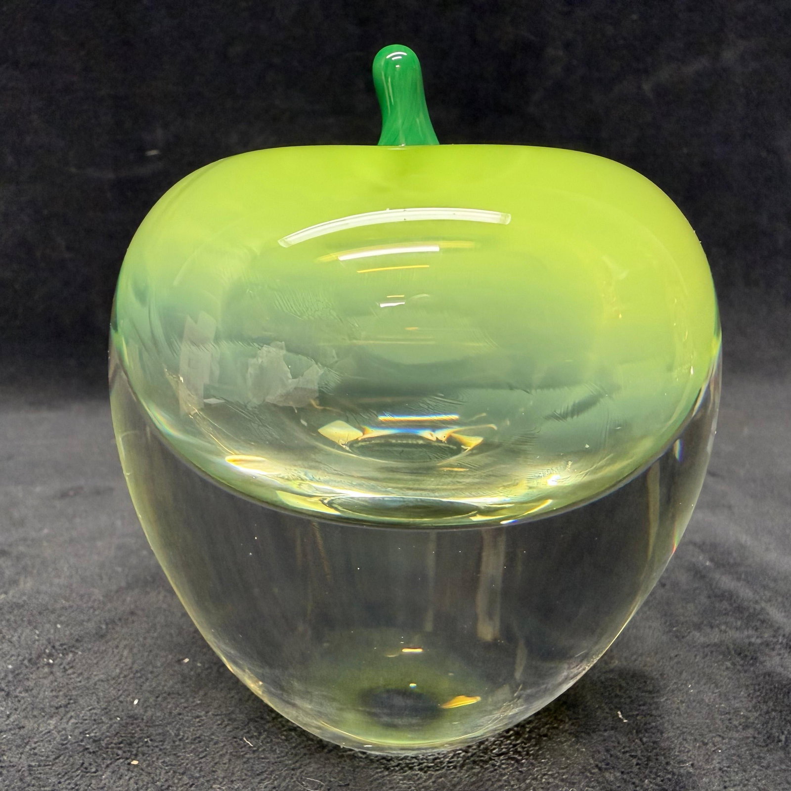 Hanne Dreutler Studio Ahus Swedish Full Lead Crystal Green Apple Glass Art: Handcrafted Swedish full lead crystal art glass apple designed by Hanne Dreutler for Studio Glashyttan Ahus. Heavy clear crystal form with vivid green coloration concentrated through the upper