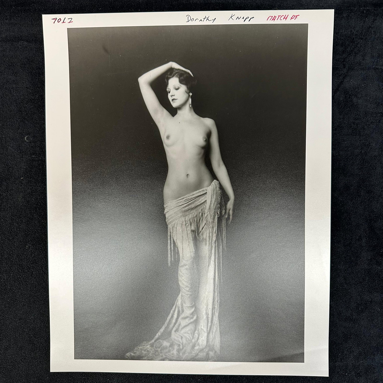 Vintage Analog Photograph Dorothy Knapp Nude Portrait: Vintage black and white analog photo print depicting Dorothy Knapp in a classic nude portrait pose, draped in a fringed wrap. Elegant and evocative 20th-century studio composition. Handwritten pen