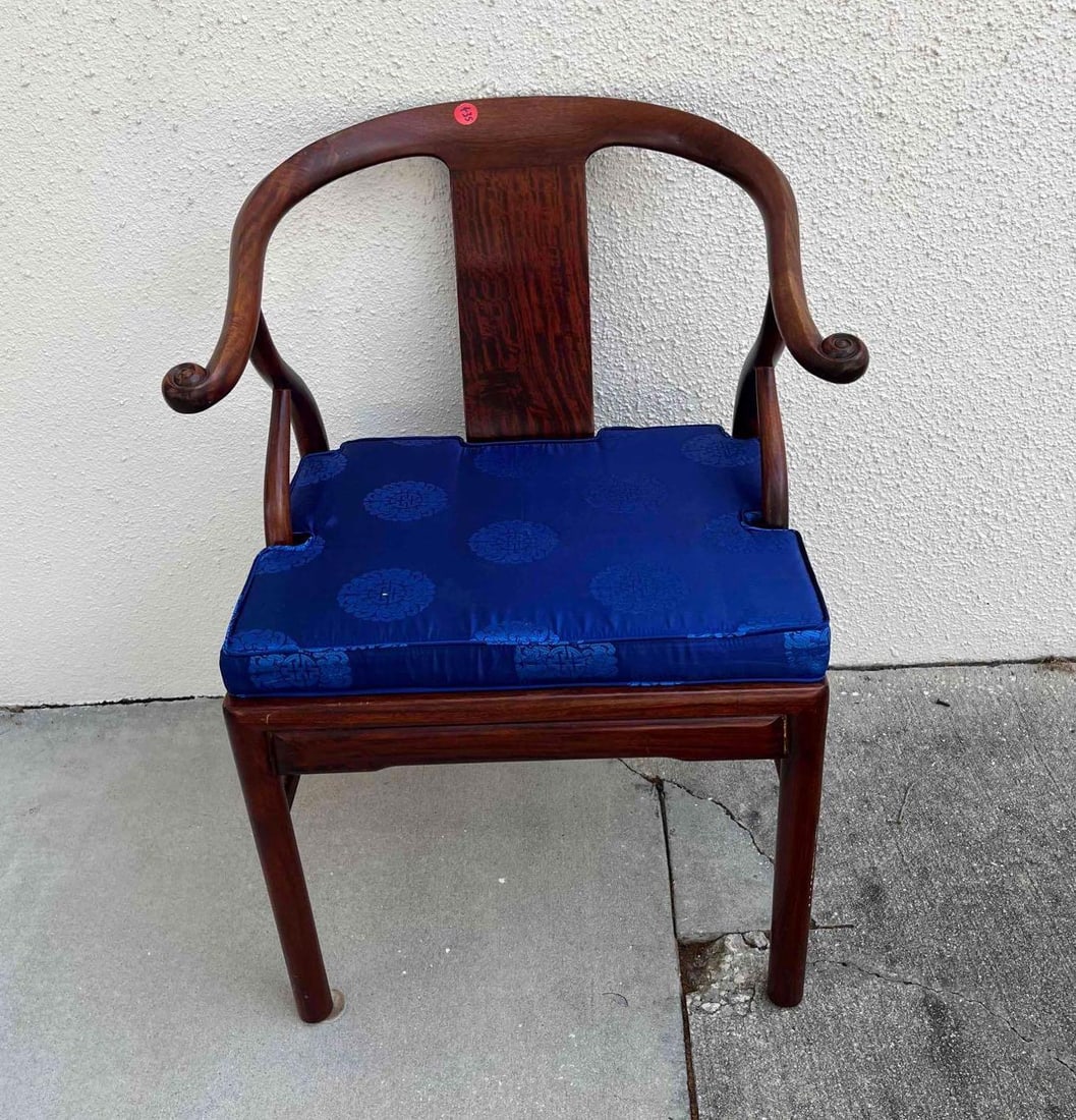 Vintage Chinese Carved Wood Ming Style Horseshoe Back Chair: This lot contains a Vintage Chinese Carved Wood Ming Style Horseshoe Back Chair. The Bottom is marked Thailand. It is approx 26" x 24" x 32". Total weight is approx 19lbs. The chair has some chips, cr