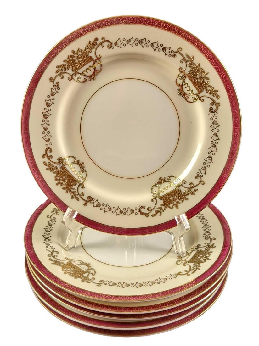 6 China Maroon Trim With Gold Inlay Salad Plates: Six Japanese China Maroon Trim With Gold Inlay Salad Plates. Is approx 7 3/8" and together they weigh 3.19lbs. The plates are in a good, vintage condition with one of the plates having a chip on the e