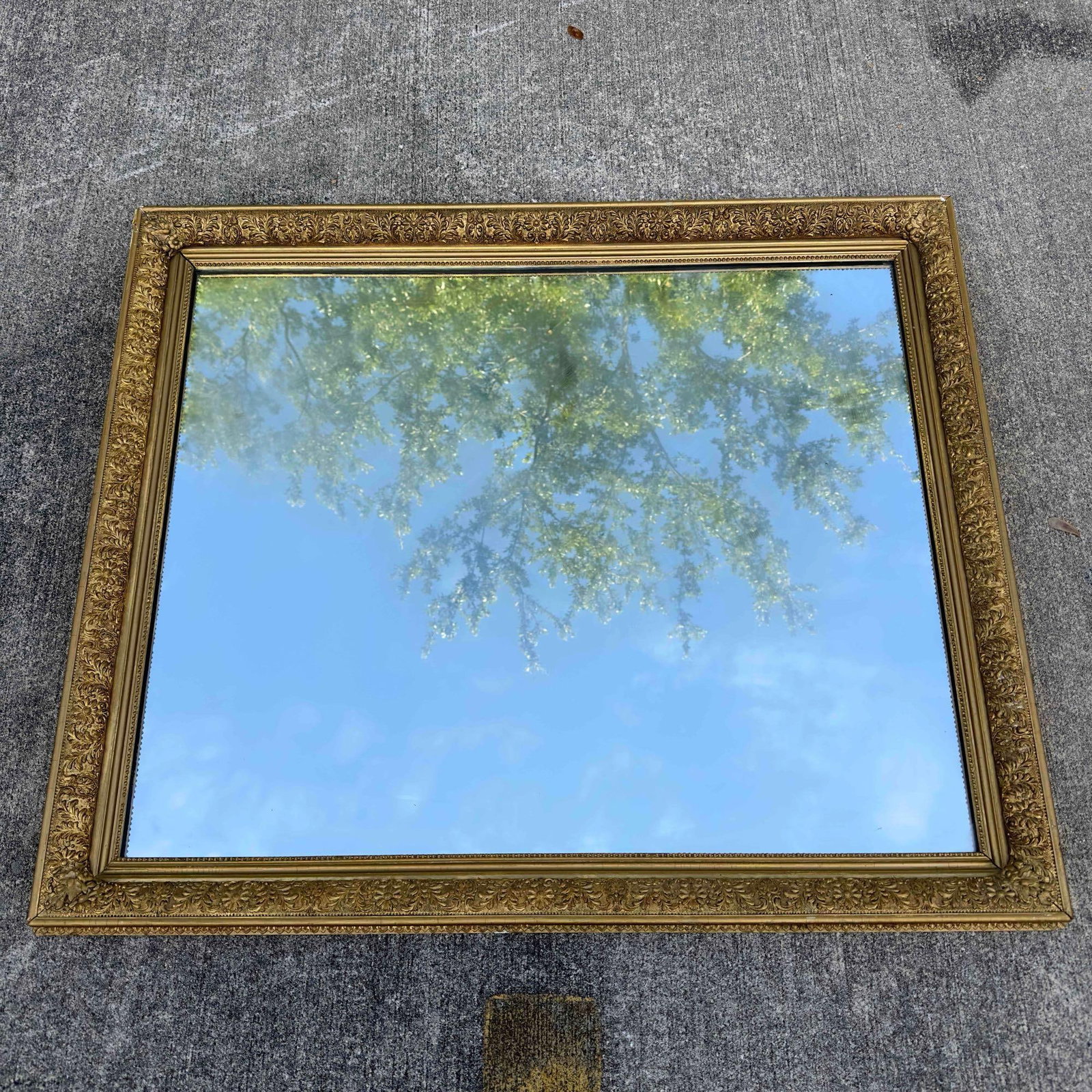 Ornate Gold Floral Leaf Design Wall Mirror 47" Wood Resin Frame Heavy: Ornate Gold Floral Leaf Design Wall Mirror 47" Wood Resin Frame Heavy. This mirror features a wooden resin frame mount with an ornate gold floral leaf design throughout the border. The mirror has 