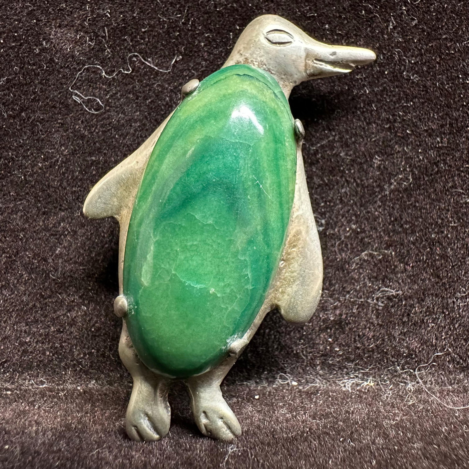 Mexico Silver Polished Green Gemstone Penguin Brooch: This item is in good pre-owned, previously used/displayed condition with noticeable light wear and surface scratches. Please reference all photos for full details. This piece of jewelry has been teste