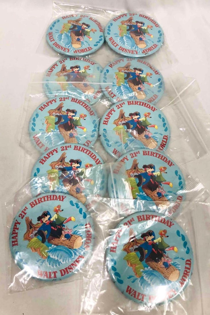 10 Rare Walt Disney World "Happy 21st Birthday" Splash Mountain Buttons: This lot contains Ten Rare "Happy 21st Birthday" buttons from the defunct "Splash Mountain" flume ride at the Walt Disney Resort in Orlando, Florida. Each Button is approx 3" x 3" and altogether they 