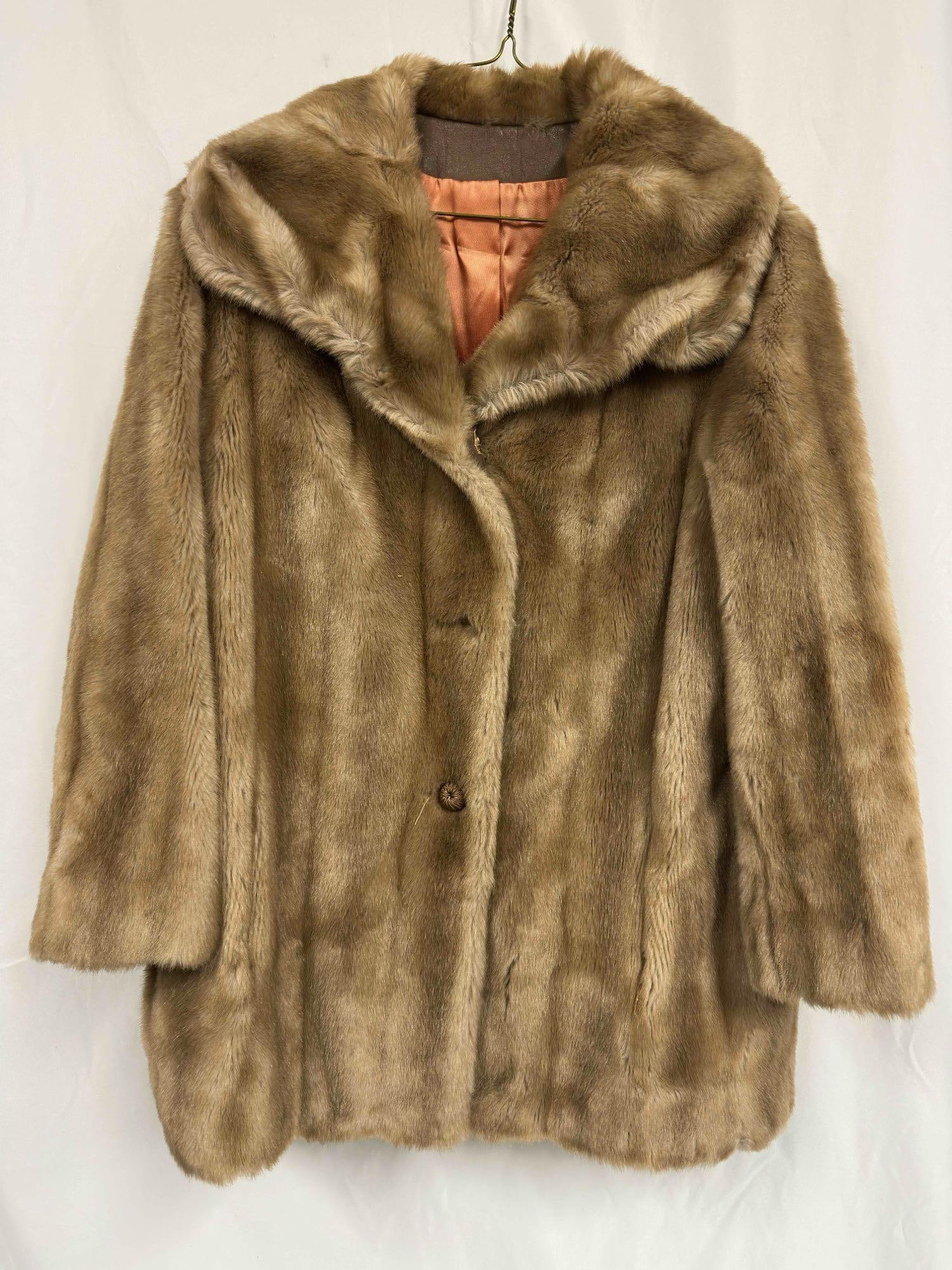 ILGWU Mink Faux Fur Coat Jacket Union Made in the USA: ILGWU Mink Faux Fur Coat Jacket Union Made in the USA. One button has broken off, has become loose, needs repair, included. This coat features two exterior pockets and three button