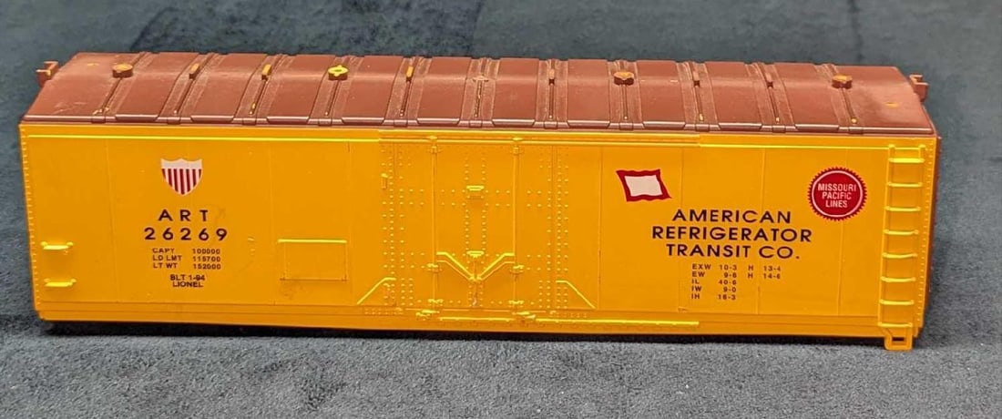 Lionel Error American Refrigerator Transit Boxcar: Lionel Error American Refrigerator Transit Boxcar. Please note, that some of the text on the "Missouri Pacific Lines" red circle has been printed over a few times (doubled). This is approximately 10 1