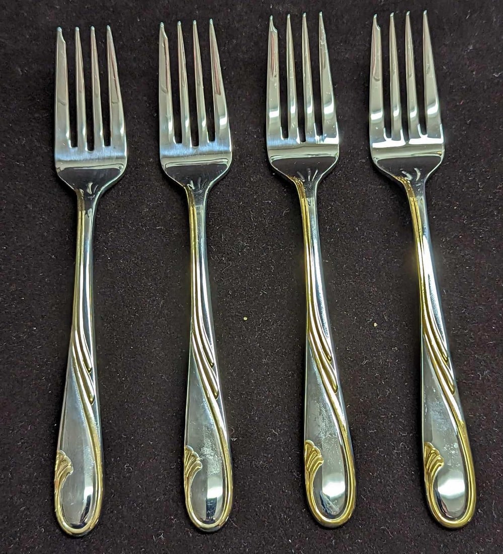 4 Retired Gorham Golden Swirl Salad Dinner Forks A: 4 Retired Gorham Golden Swirl Salad Dinner Forks A. This series was released by Gorham Silver from the year 1982 to the year 2001. These stainless steel forks have signs of light wear with markings an