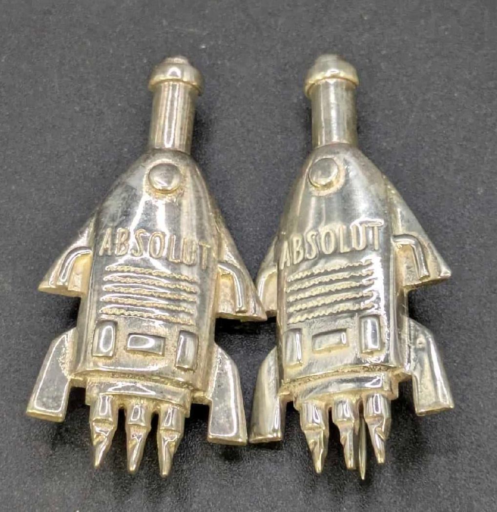 2 Sterling Silver Brooch Pins Absolut Vodka Bottle Rocket CC: 2 Sterling Silver Brooch Pins Absolut Vodka Bottle Rocket CC. These fine vintage pieces have been tested and researched before listing. Please view all our photos they are part of our description. Met