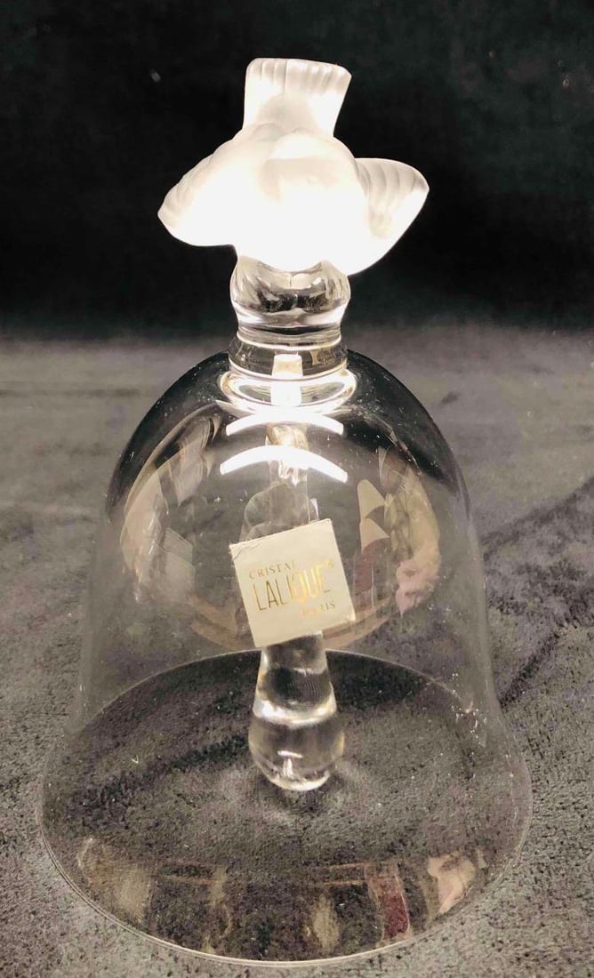 Signed Lalique Crystal Frosted Open Wing Sparrow Table Bell: This lot contains a Signed Lalique Crystal Frosted Open Wing Sparrow Table Bell. It is approx 3 3/4" x 3 3/4" x 5 1/4" and it weighs about 0.4lbs. Overall the Llaique Table bell is in good used condit