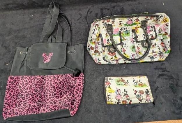 Disney Minnie Mouse Backpack Wallet Bag: Disney Minnie Mouse Backpack Wallet Bag. This lot includes: (1) Mickey And Minnie Mouse Comic Strip Handbag. This is approx 13" x 4" x 9 1/2". Is made of a faux leather. Has some sig
