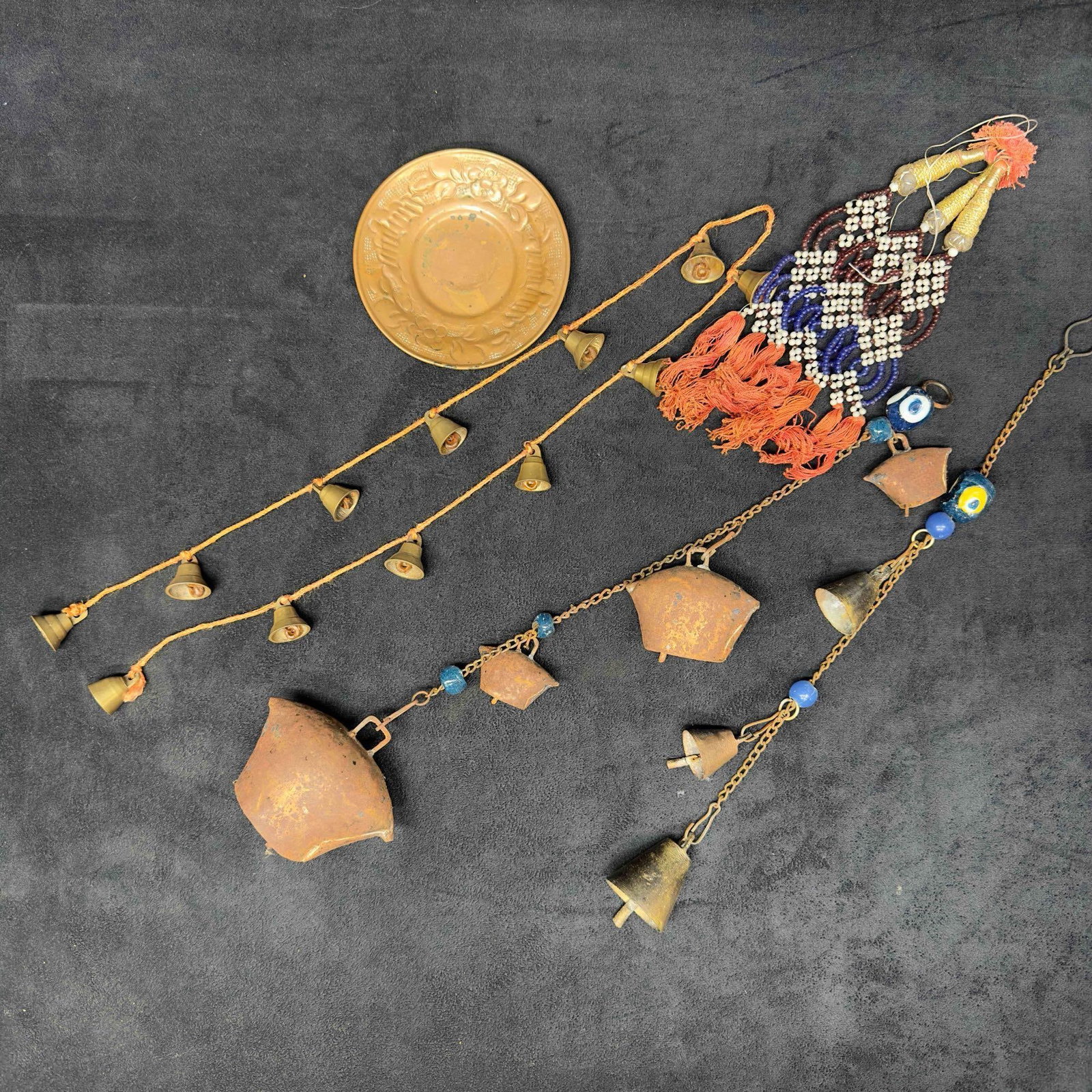 Blessed Bells Wind Chime Brass Bell Plate India Decor Set: Blessed Bells Wind Chime Brass Bell Plate India Decor Set. This set of blessed bell wind chimes has a unique rope design with brass bells. Each wind chime decor has various designs. One brass plate is
