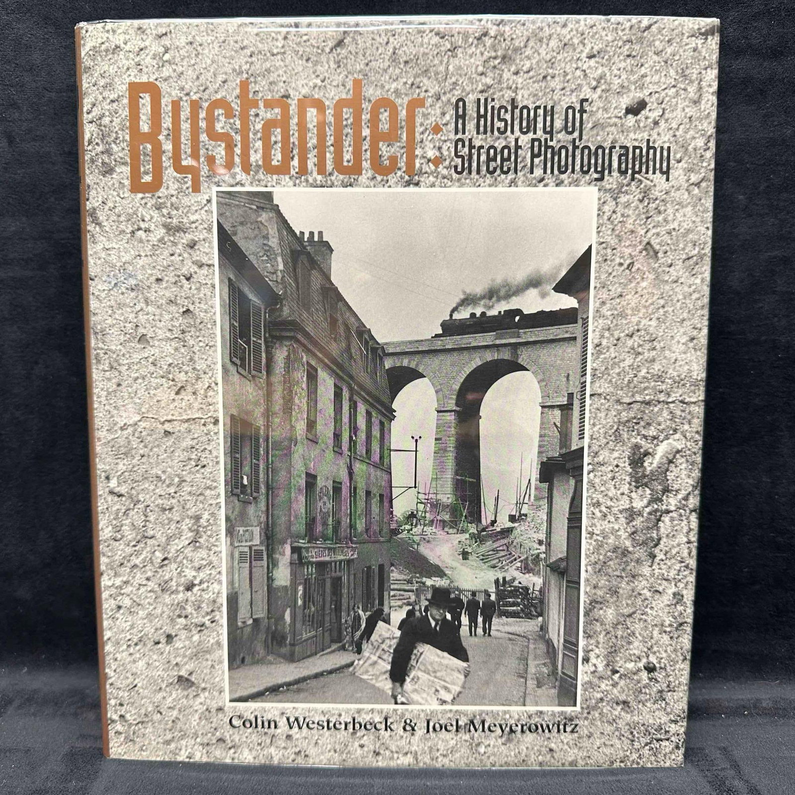 Bystander A History of Street Photography by Colin Westerbeck and Joel Meyerowitz Signed Hardcover: Signed first edition of Bystander: A History of Street Photography, authored by Colin Westerbeck and Joel Meyerowitz. This landmark book offers a comprehensive, critical survey of the evolution of str