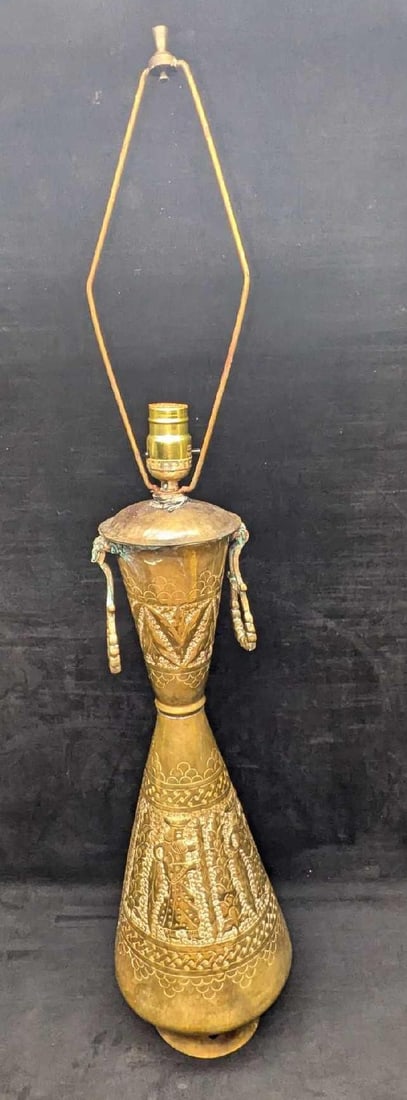 Vintage Converted Brass Vase Lamp: Vintage Converted Brass Vase Lamp. This appears to be an vintage etched brass vase that had been converted into a lamp. Untested. This is approx 8" x 8" 36" (The harp cannot be removed). The converted