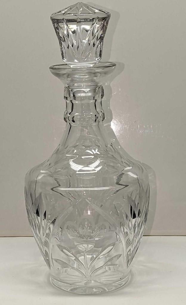 Vintage Crystal Floral Decanter: Vintage Crystal Floral Decanter. The maker and date of creation are unknown. This is approx 5" x 5" x 11 1/2" and it weighs 2.90 lbs. The decanter has some light scratches and has some markings inside