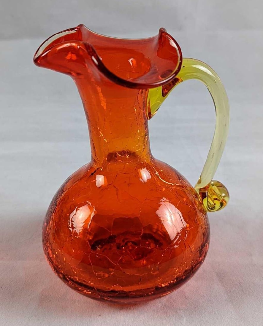 Vintage Red Crackle Glass Small Vase: Vintage Red Crackle Glass Small Pitcher Or Creamer. Maker is unknown. Is approx 3 1/2" x 3" x 4 1/2" and it weighs 0.43lb. The small pitcher is in a good, vintage condition with no chips or cracks.